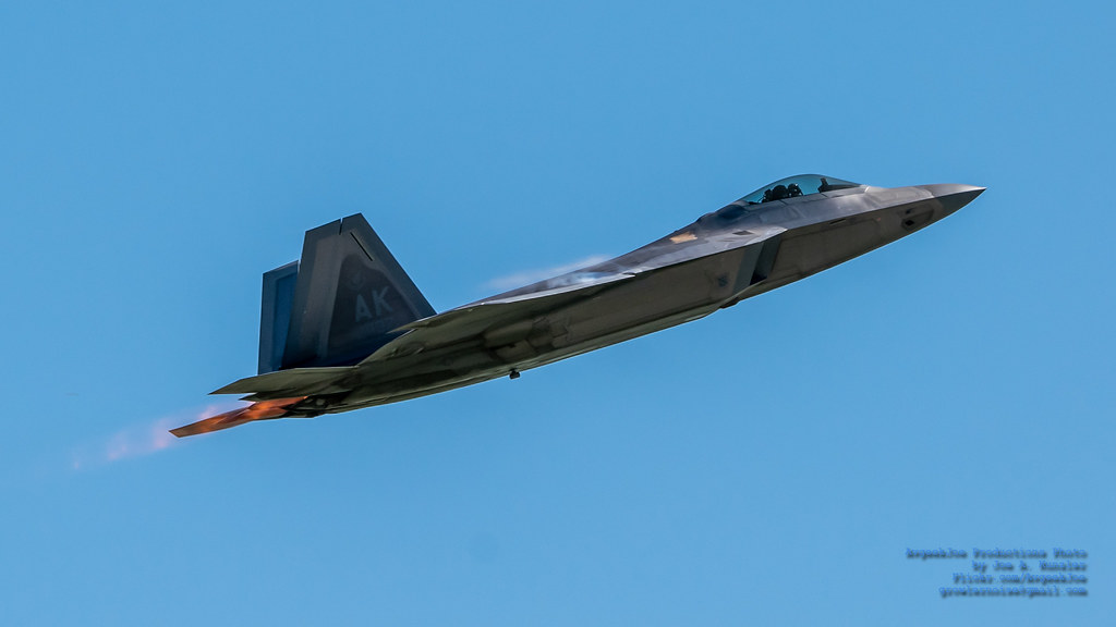 RAPTOR IN BURNER CLIMBING INTO THE BLUE