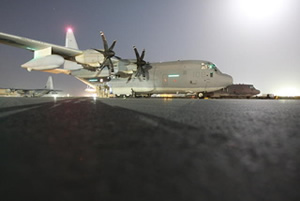 Hose falls from Marine plane onto home