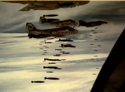 A-6A's of VA-35 and unknown F-4's bombing circa 1972