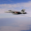 F-18E testing out inflight refueling a E-2C 2000 Hawkeye