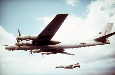 TU-95 Bear E intercepted by a USN F-4J of VF-31