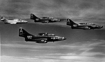 F9F-5 Panthers of VF-144 over NAS Cubi Point