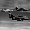F9F-5 Panthers of VF-144 over NAS Cubi Point
