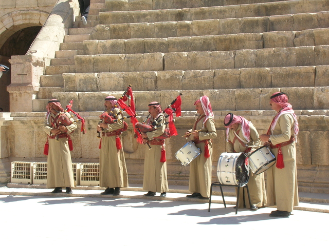 Jordanian pipers in a Roman theater