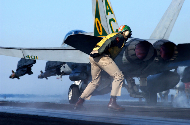 F/A-18 Hornet being launched off the deck of the USS Harry S Truman CVN 75